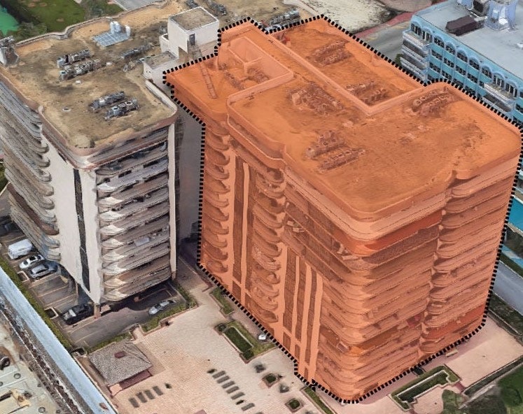An infrared aerial view of a building with a brown roof. An infrared aerial view of a building with a brown roof.